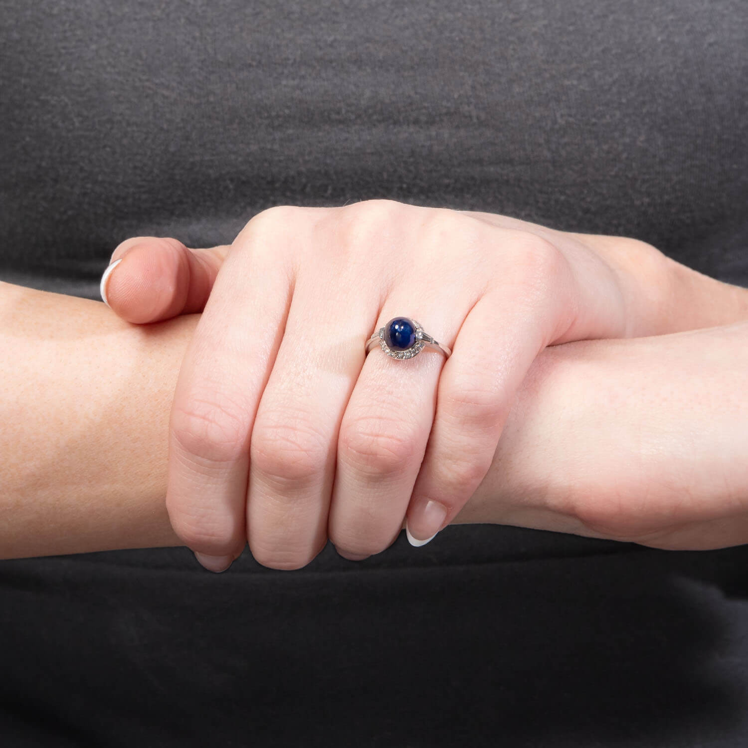 Estate Platinum Sapphire and Diamond Halo Ring