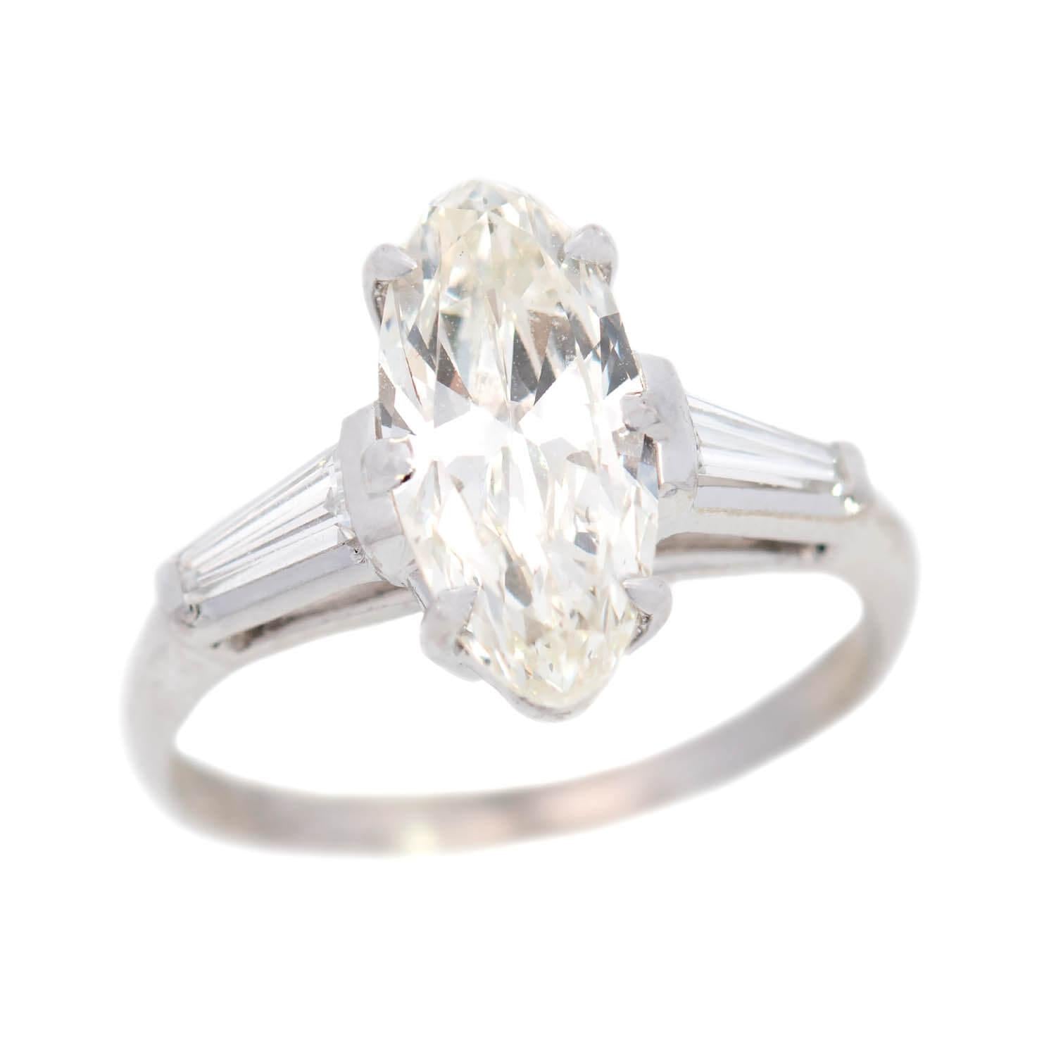 Retro Platinum Moval Cut Diamond Engagement Ring