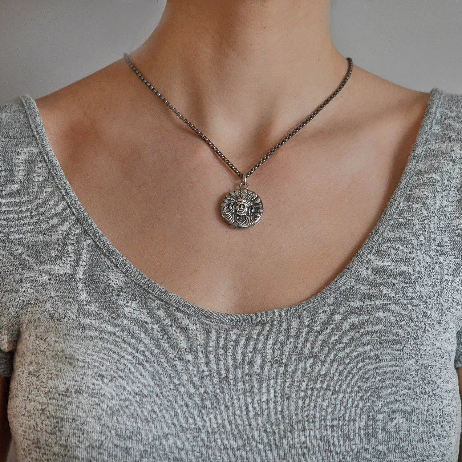 UNGER BROS. Late Victorian Sterling Native American Chief Repousse Locket