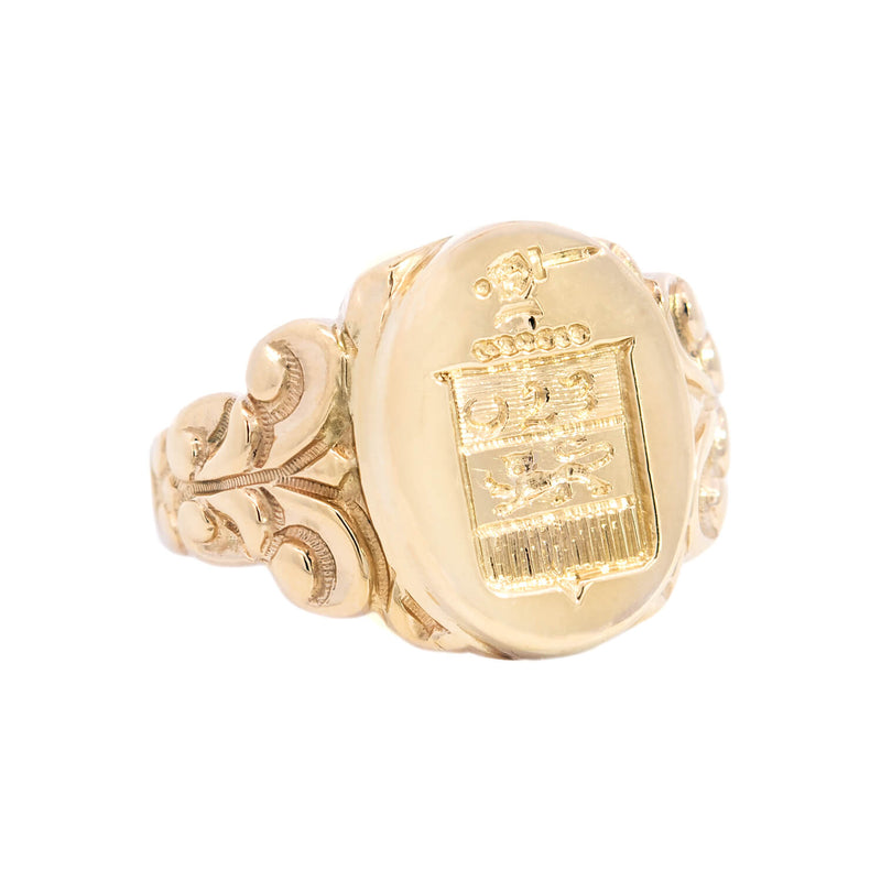 Sold at Auction: 18ct gold signet ring with family crest. Hallmarks worn  but tested as 18ct / high carat gold. Size O, weight 7.4g.