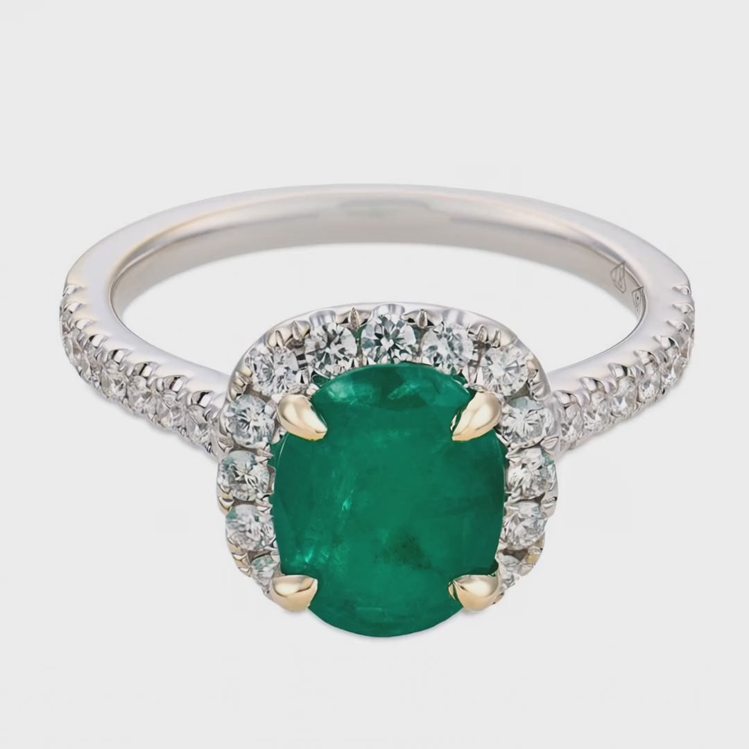 Load video: Estate 18k Emerald &amp; Diamond Halo Ring