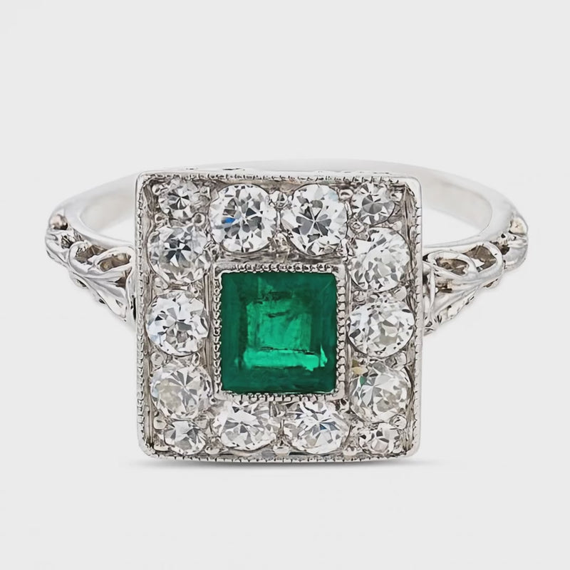 Edwardian Platinum Emerald & Diamond Halo Ring