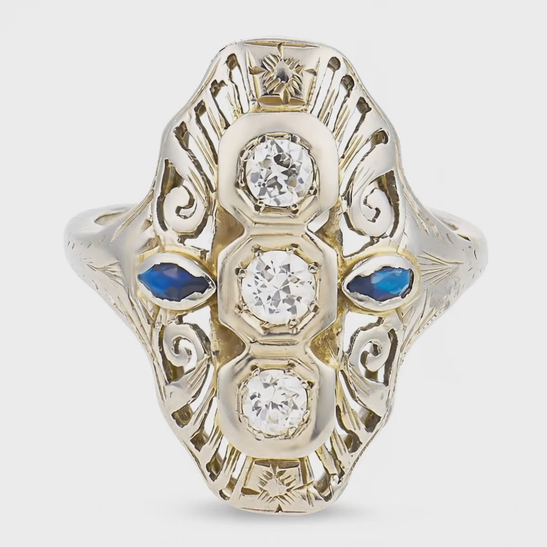 Load video: Edwardian 10k Diamond &amp; Sapphire Navette Ring
