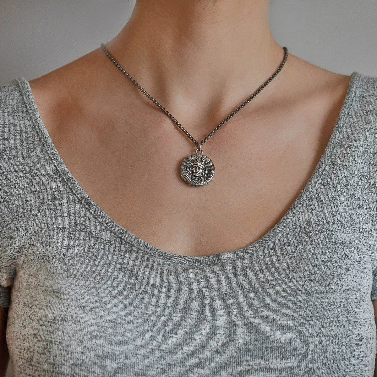 UNGER BROS. Late Victorian Sterling Native American Chief Repousse Locket